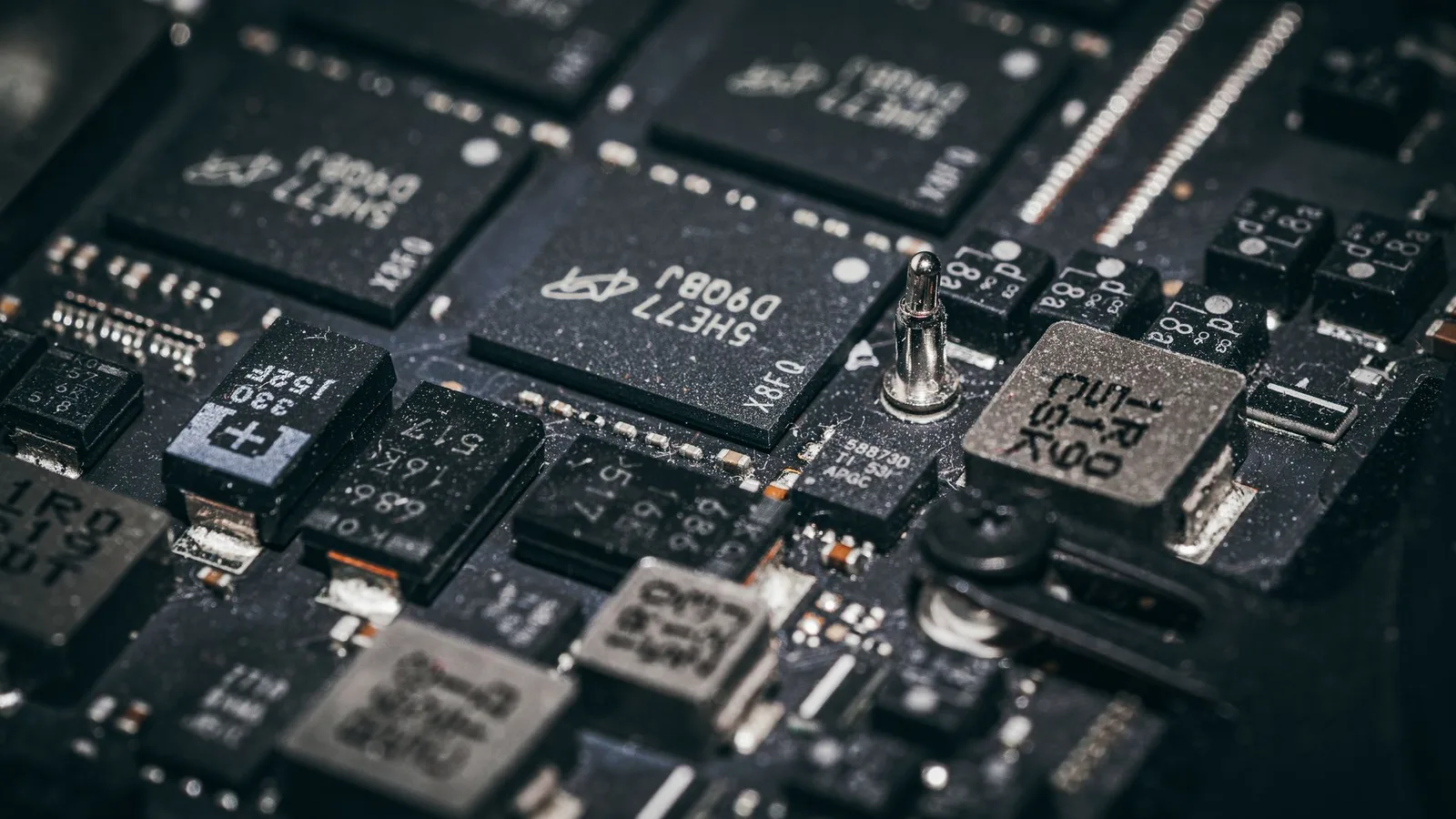 Close-up of a populated circuit board with multiple chips